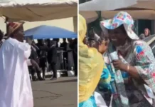 NIGERIANS REACT AS NAIRA NOTES SPRAYED ON TINUBU’S PRAISE SINGER ‘RARARA’ DURING PRESIDENTIAL VISIT TO ADAMAWA (VIDEO)