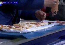 FAN CASUALLY SLICES JAMON SANDWICH IN STANDS DURING ATLETICO-TOTTENHAM UCL CLASH