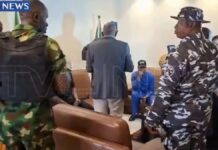 MC OLUOMO ESCORTED BY SOLDIERS, POLICEMEN AS HE REGAINS CONTROL OF NURTW NATIONAL SECRETARIAT